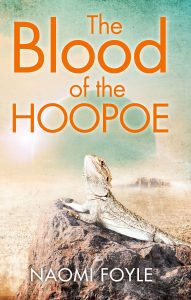 The cover of The Blood of the Hoopoe: Book Three of the Gaia Chronicles. Cover image is an colour illustration of a white lizard on a rock in a desert scene.