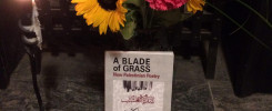 A Blade of Grass with a bouquet of flowers